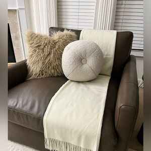 2 crate and barrel round pillows